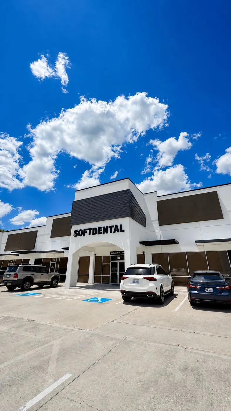 SoftDental building exterior at 10028 West Rd Ste 108, Houston TX — ample parking and ADA-accessible entrance