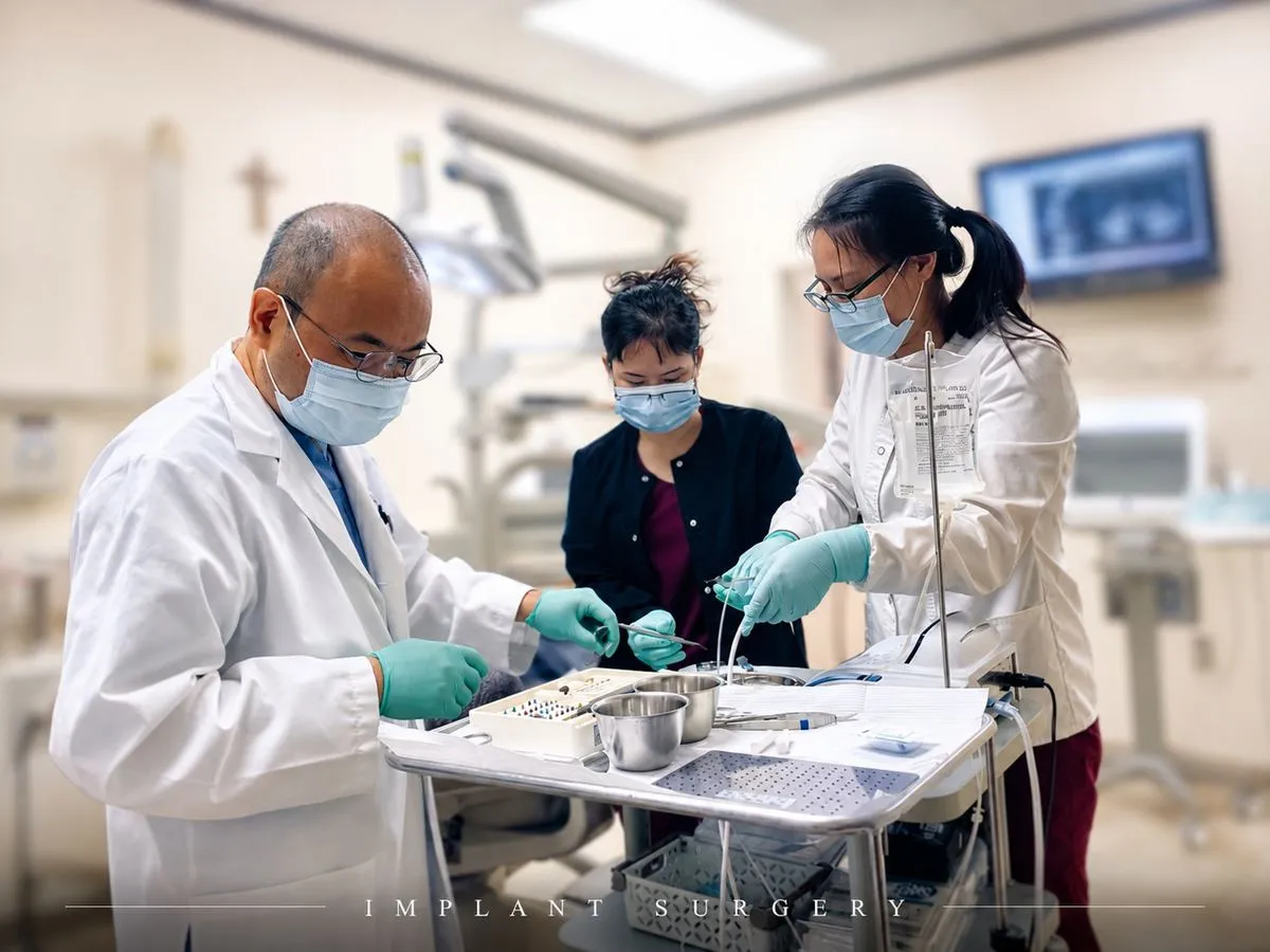 Dr. Nguyen and surgical team preparing implant placement instruments with IV sedation setup